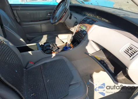 2003 Toyota Avalon Xls z USA, uszkodzony, nr VIN 4T1BF28B93U320967